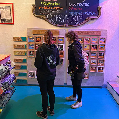 The information board in the entrance of Camere d'aria is used